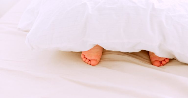 Why Do Dogs Sleep at Your Feet? Unveiling the Heartwarming Reasons